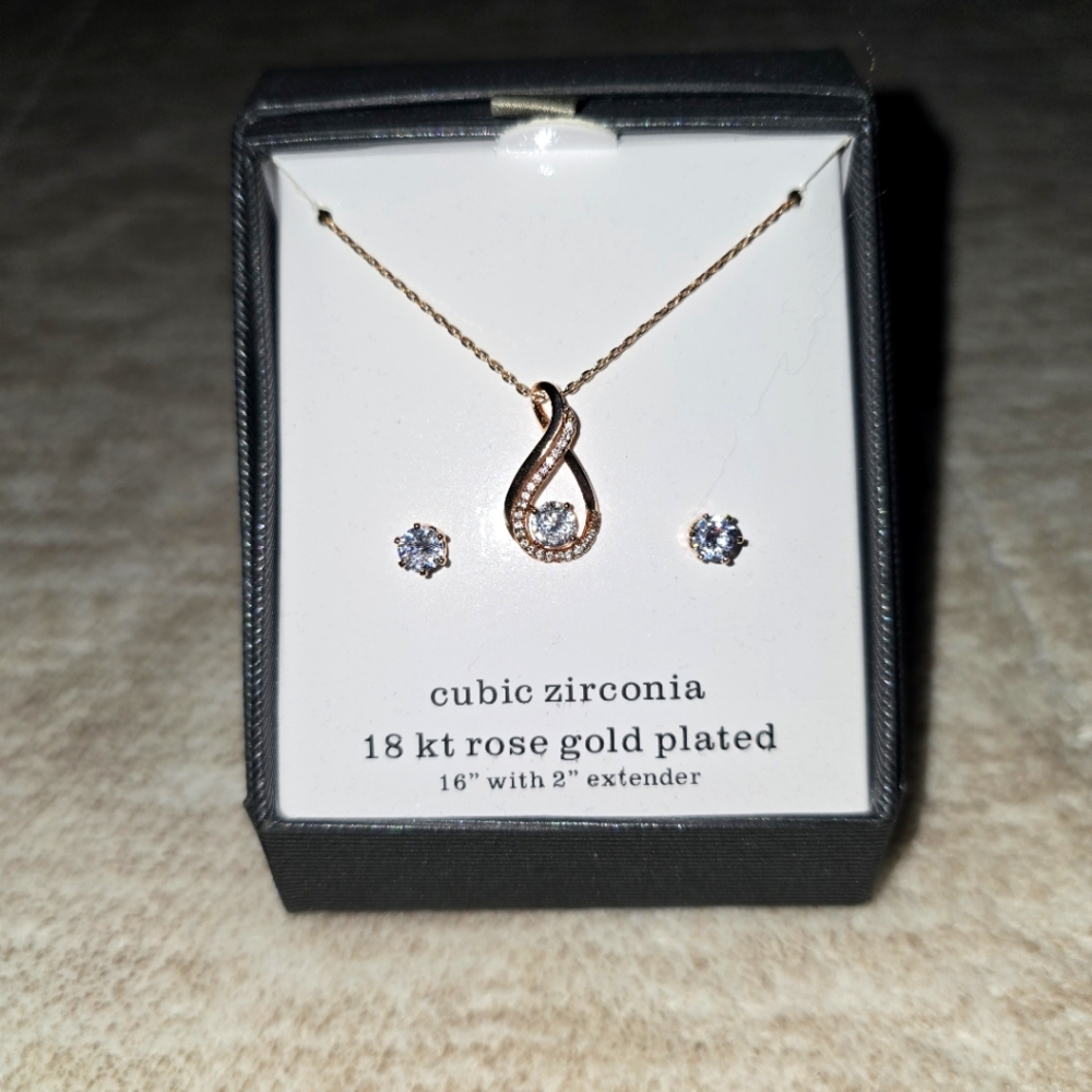 Never worn, rose gold necklace and earring set